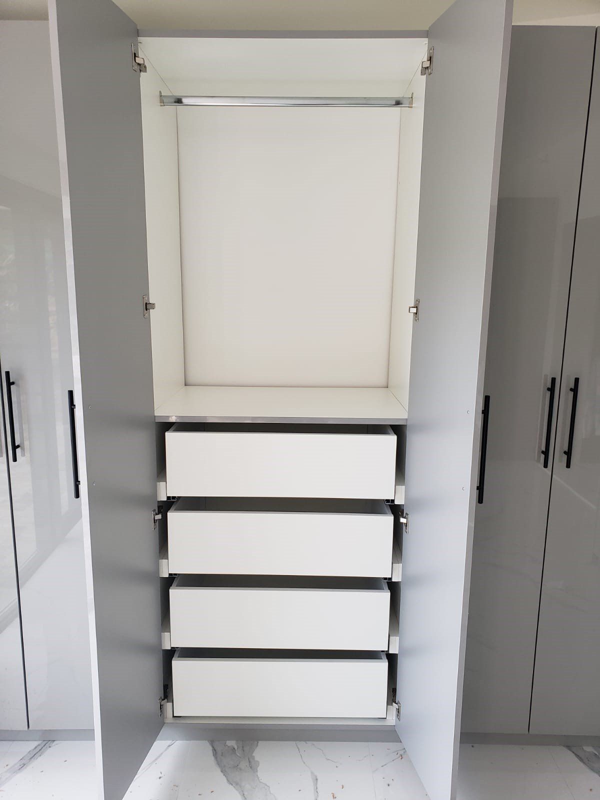 Drawers in cabinet