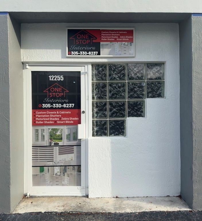 A building with a sign that says one stop