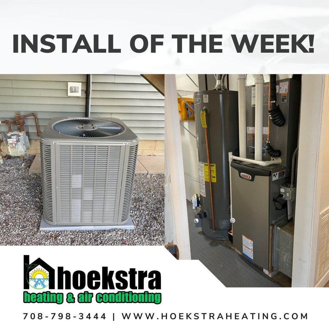 A picture of a newly installed air conditioner and furnace.