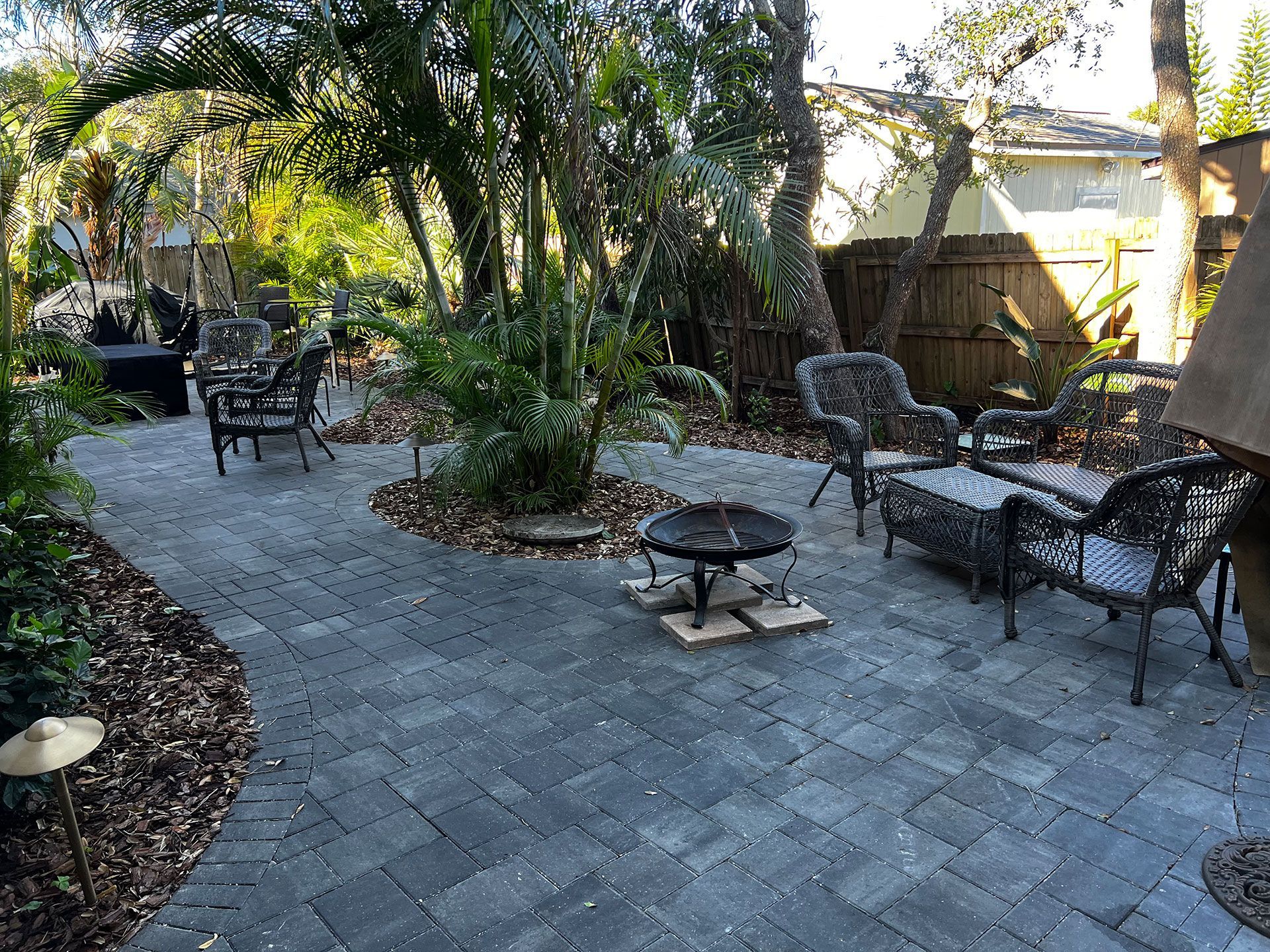 patio surrounded by plants