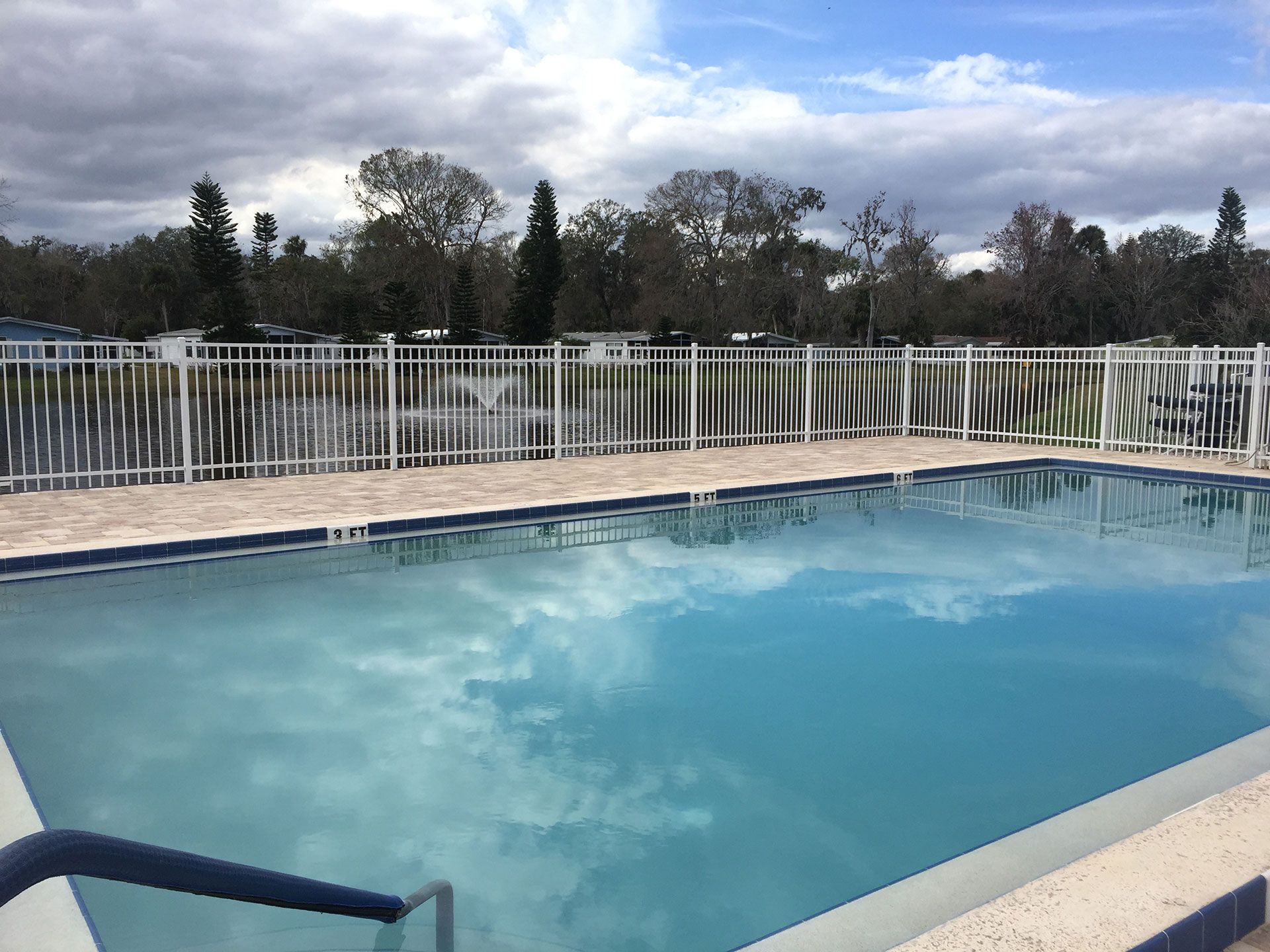 fenced rectangular pool