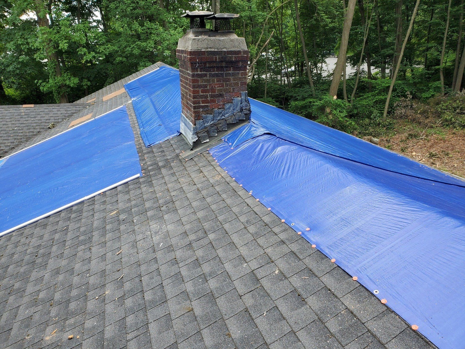 Residential roofing and chimney flashing