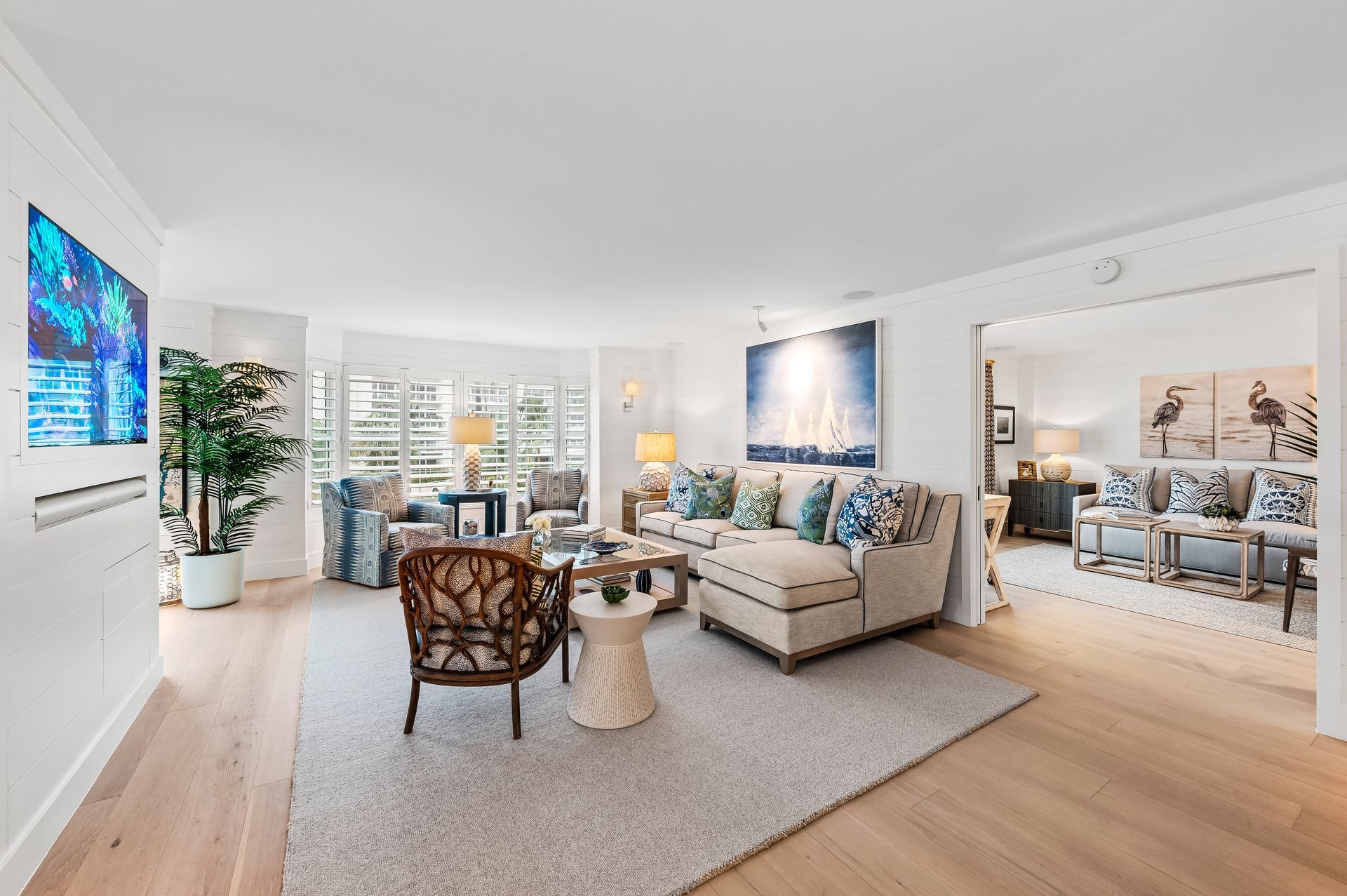 A living room filled with furniture and a flat screen tv.