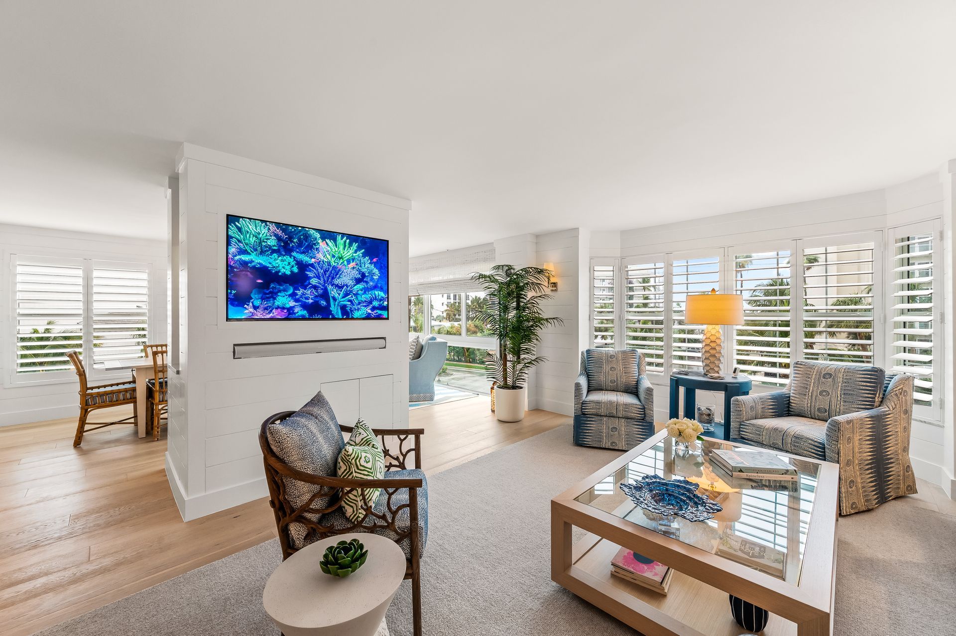 A living room filled with furniture and a flat screen tv.