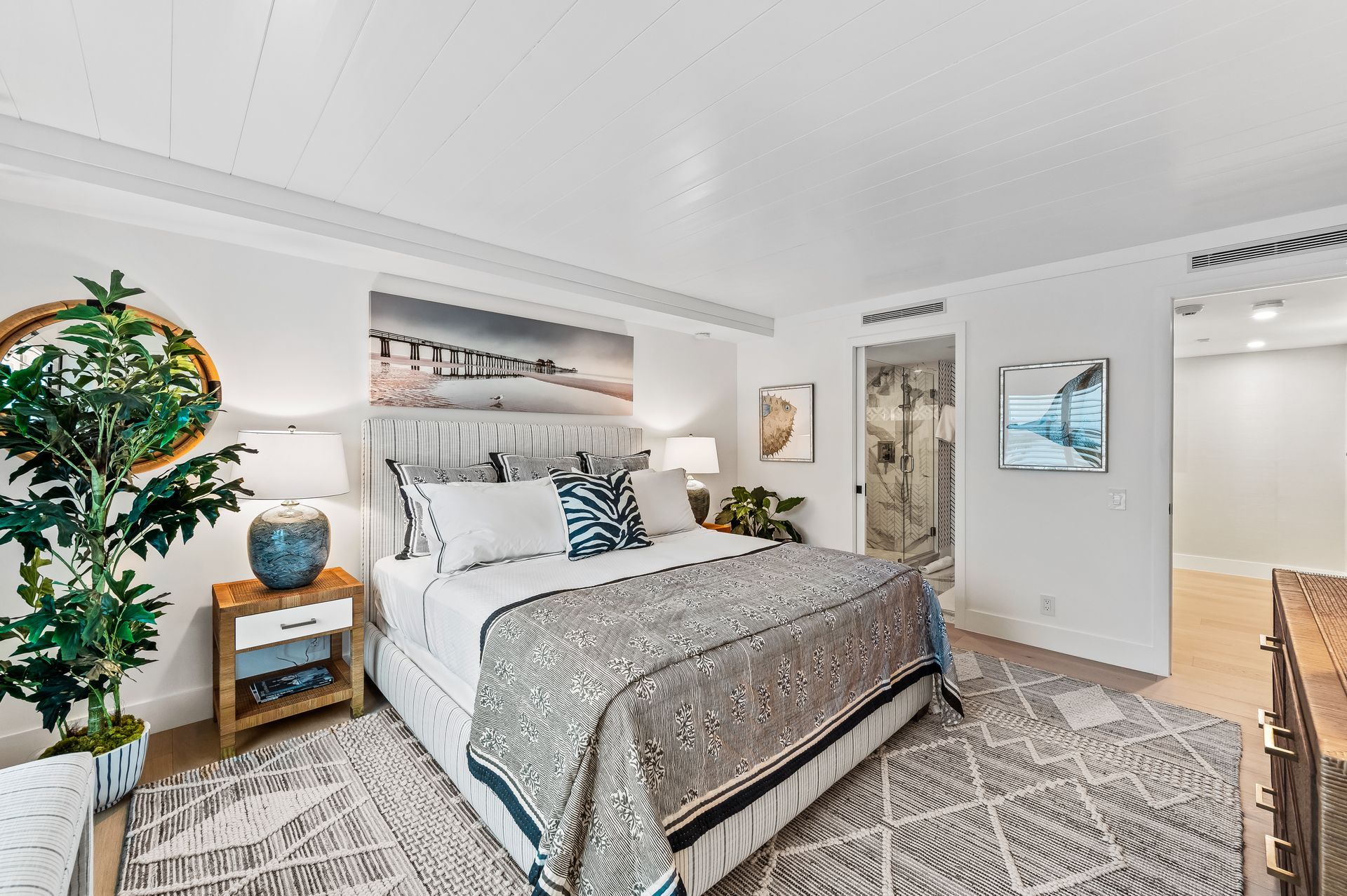 There is a large bed in the middle of the room.