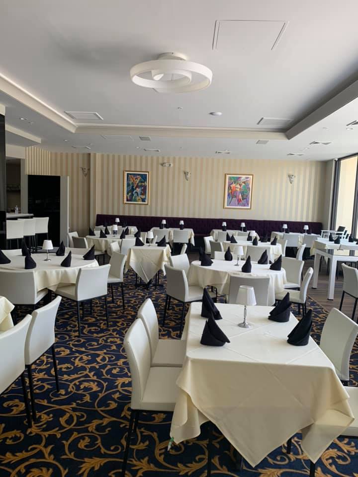 A large dining room filled with tables and chairs