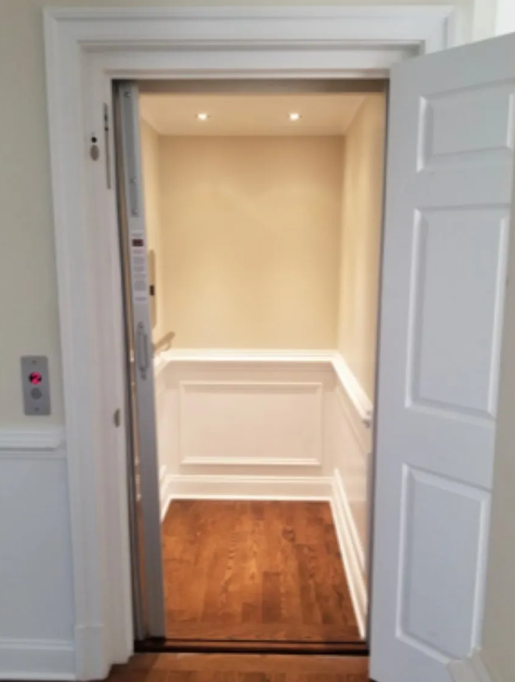 white interior symmetry elevator