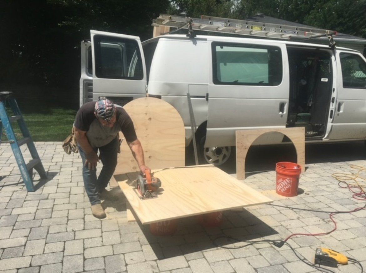 men working on the sides of PVE