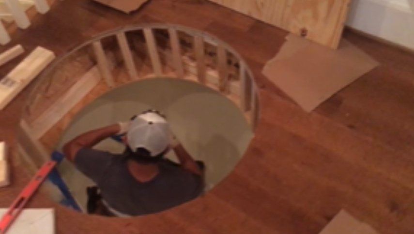 man on Pneumatic Vacuum Elevator shaft