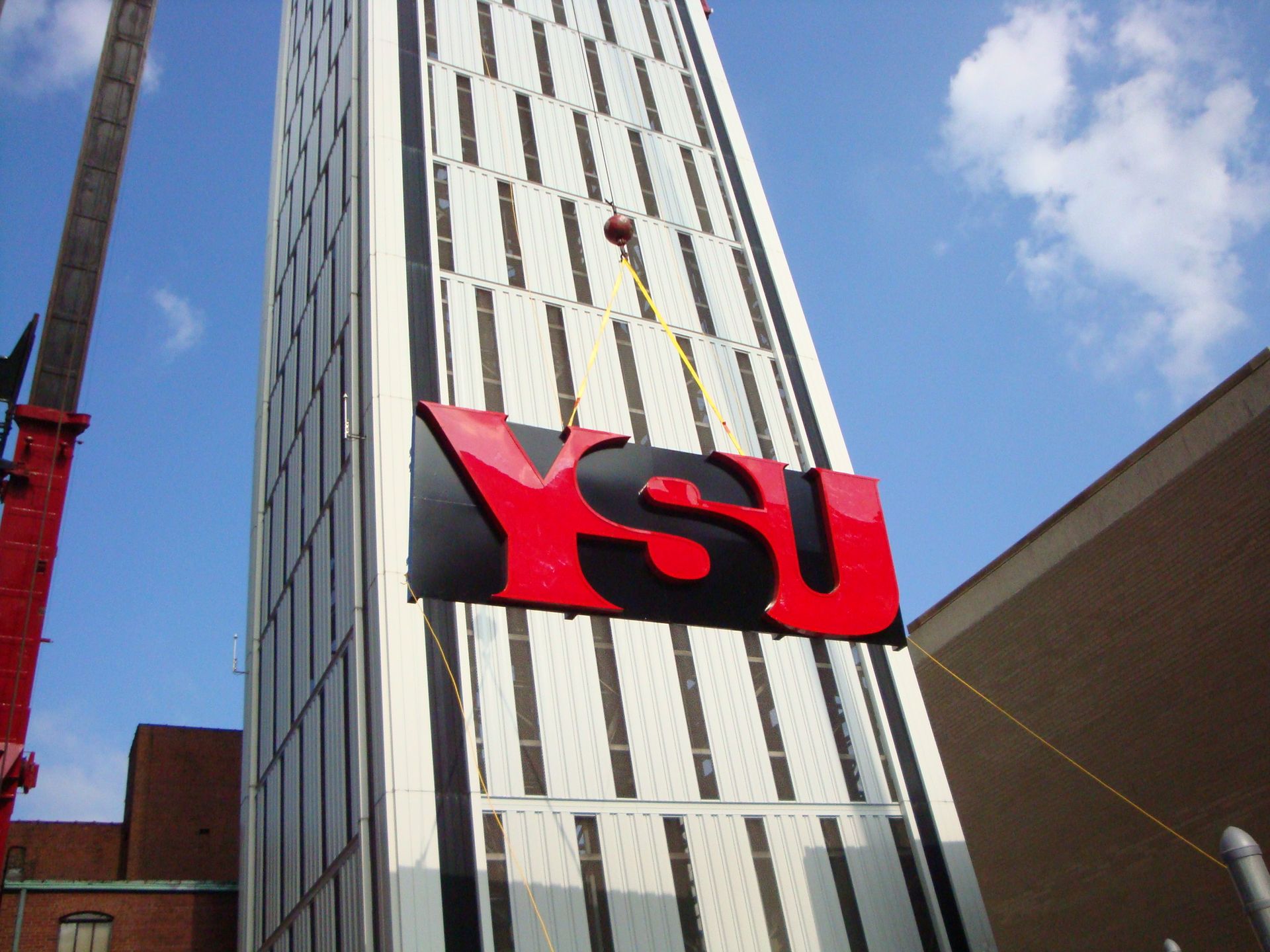 a very tall building with the word ysu on it
