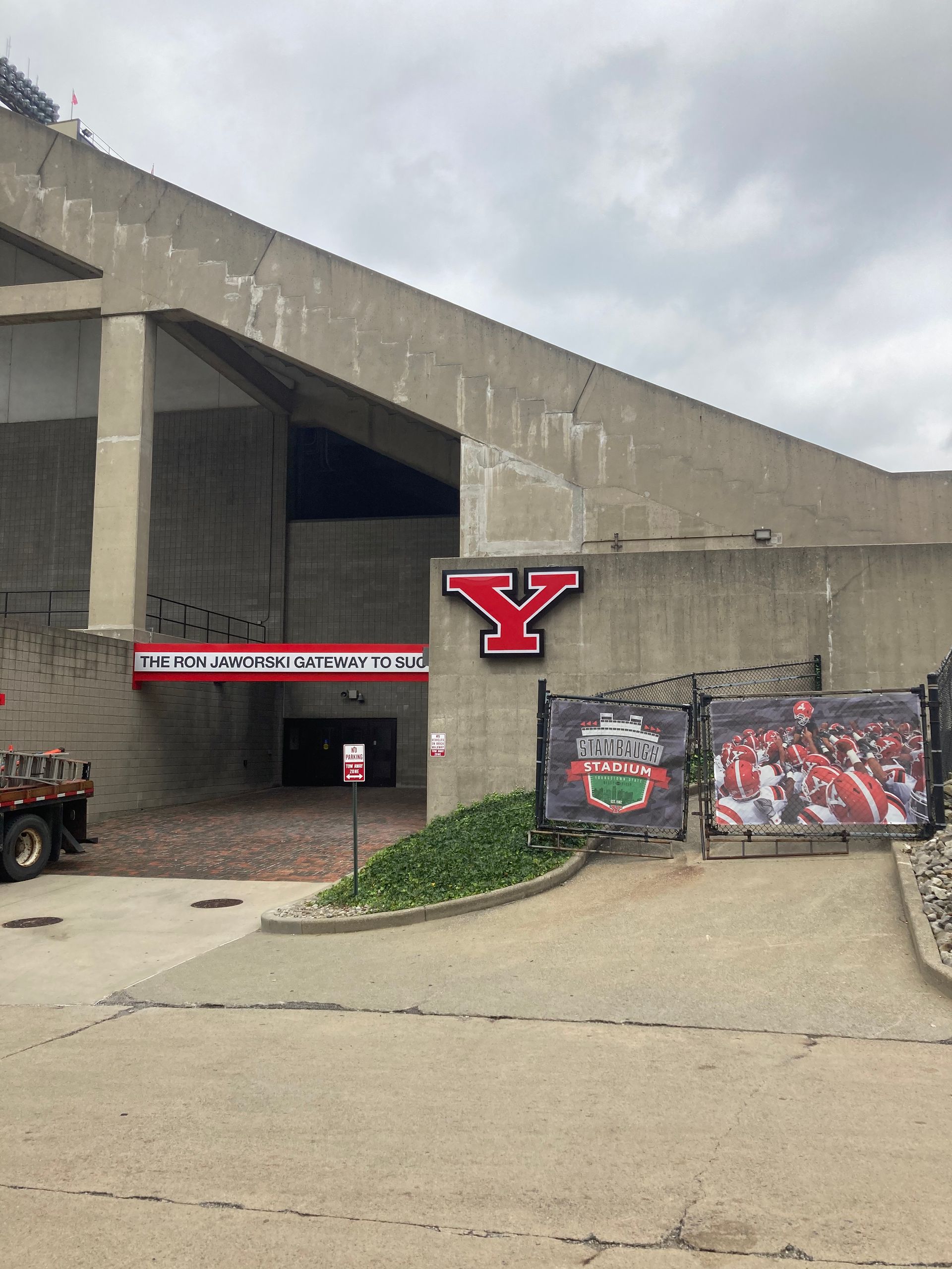 a large concrete building with the letter y on it