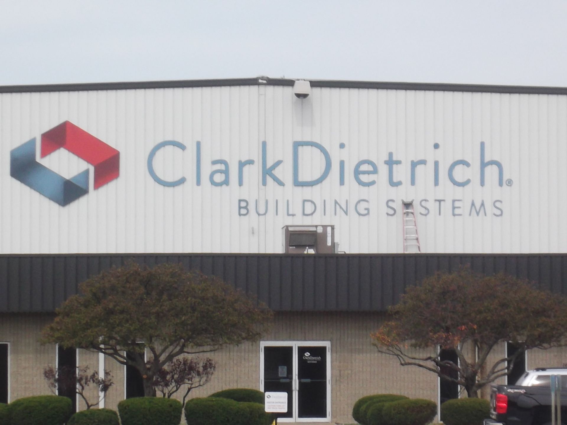 a clark dietrich building systems sign on the side of a building