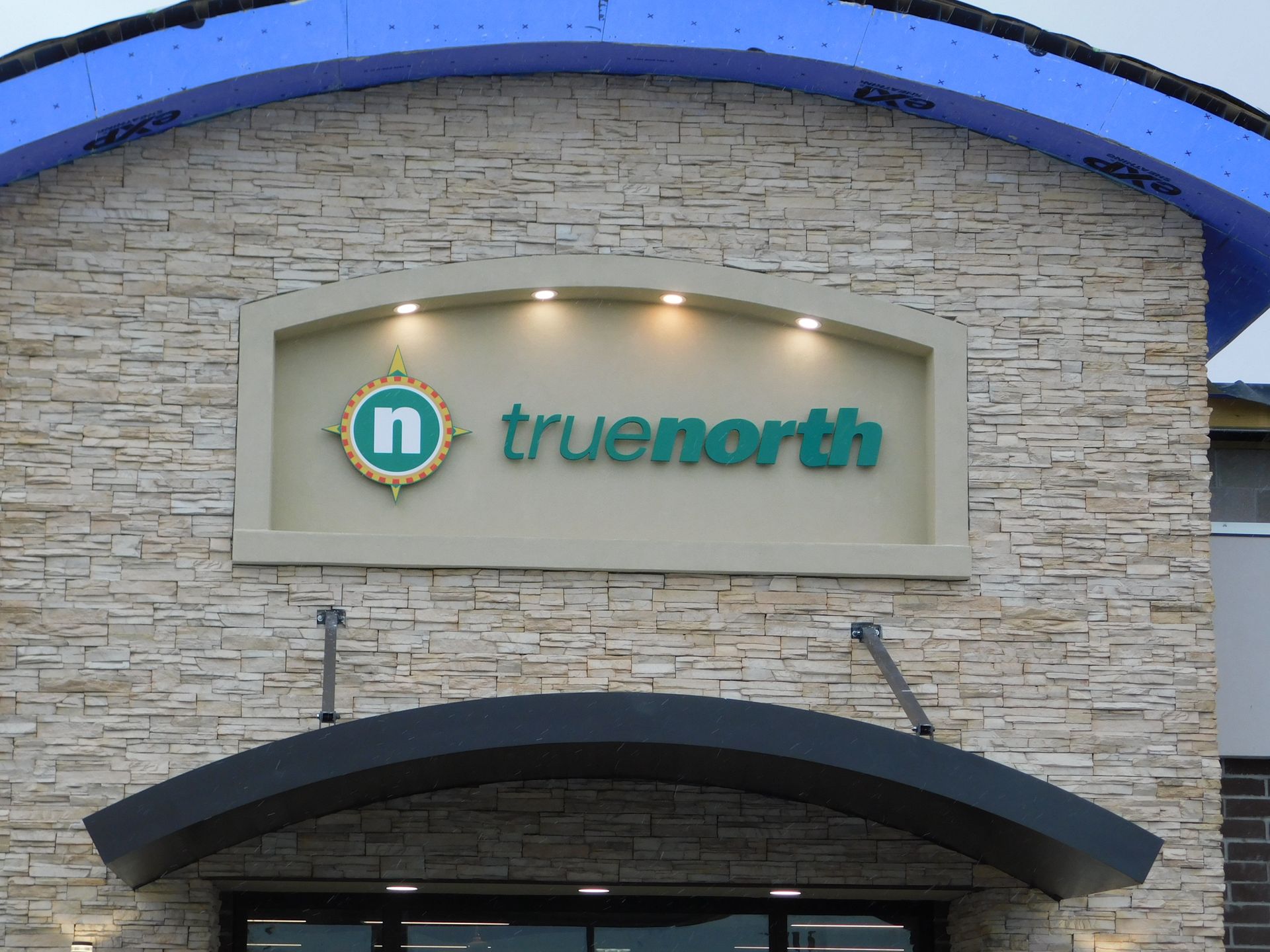 a building with a sign that says truenorth on it