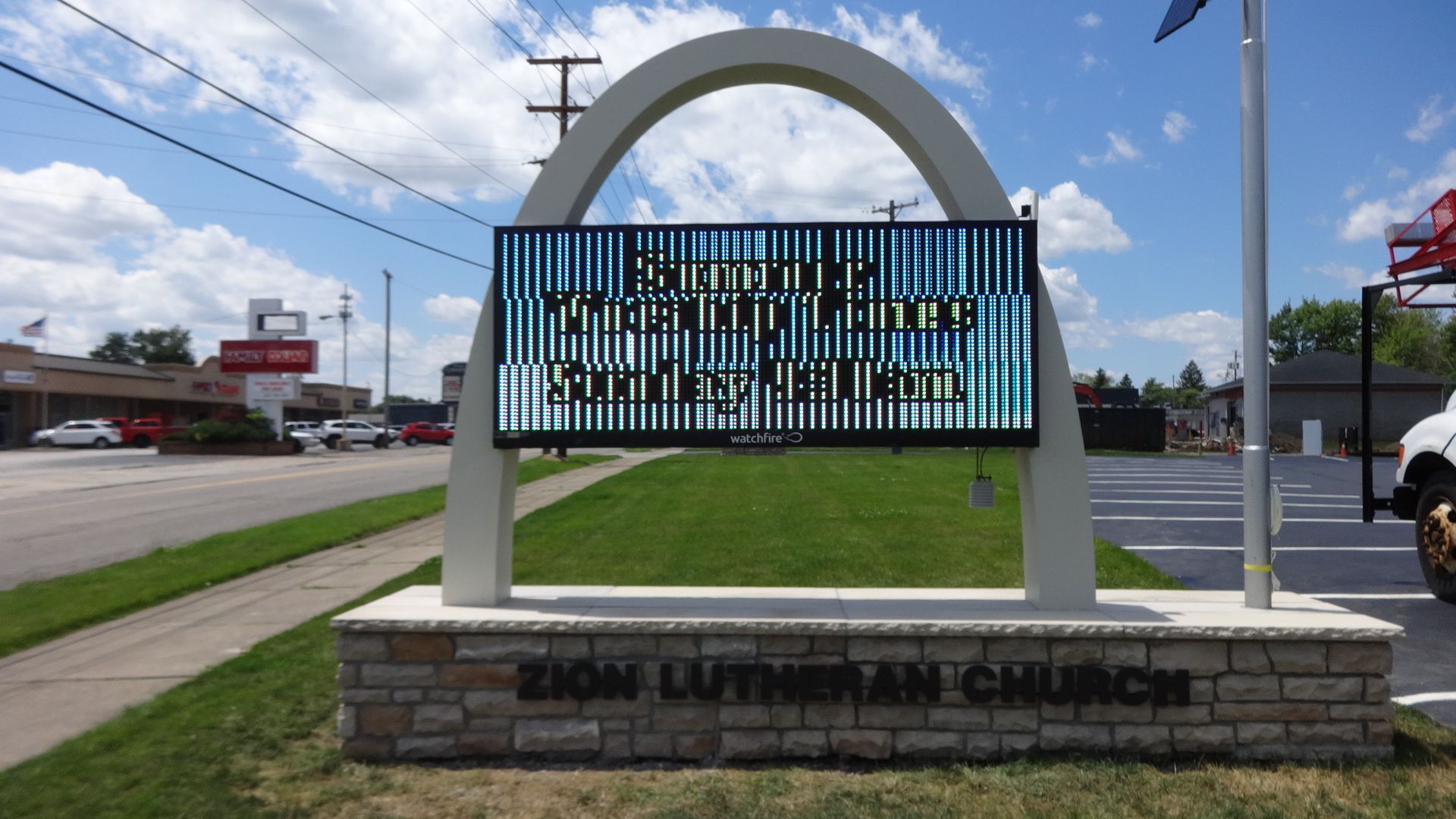 a sign that says sunday morning service on it