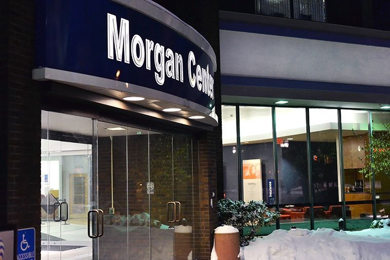 the entrance to the morgan center is covered in snow