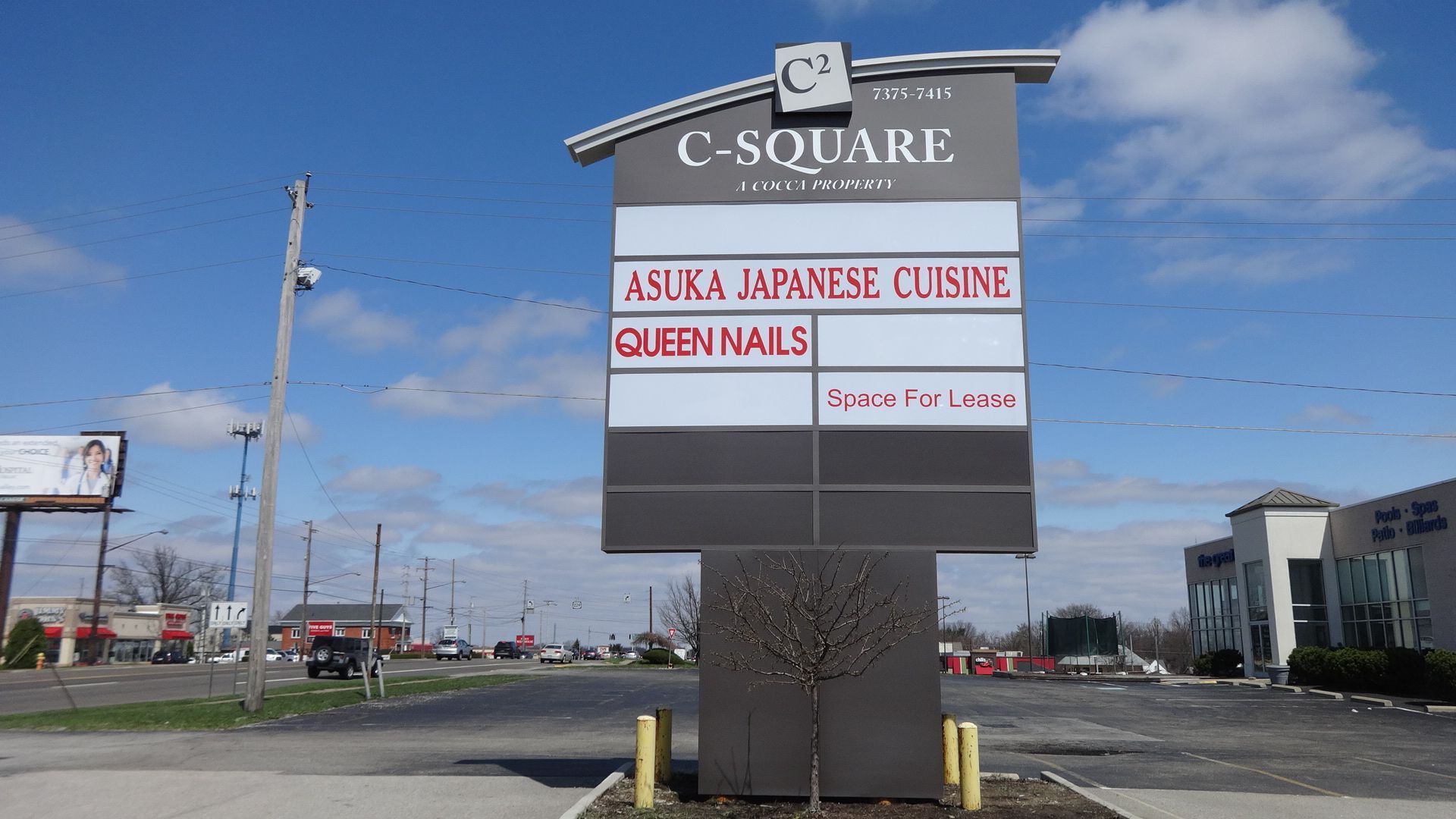 a large sign that says c square on it