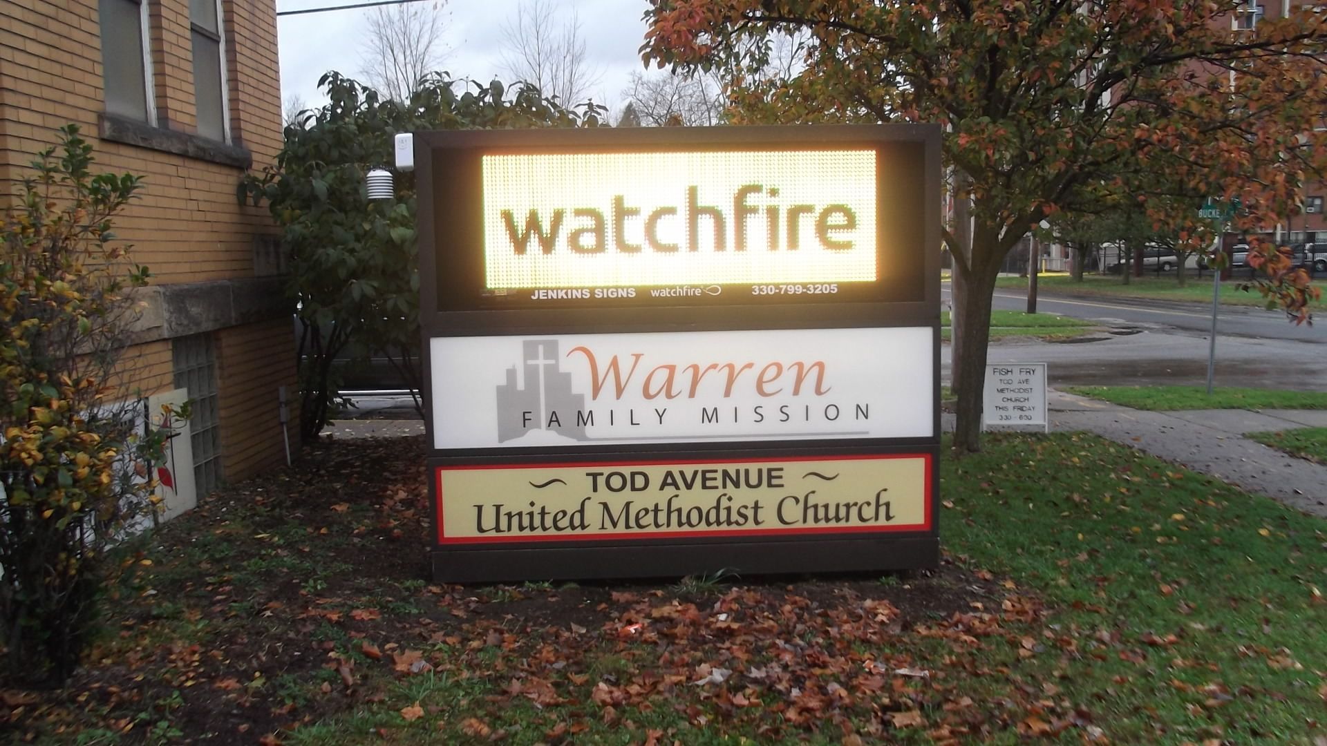 electronic message board sign above warren family mission sign