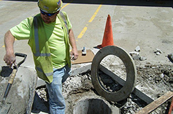 man working on concrete floor