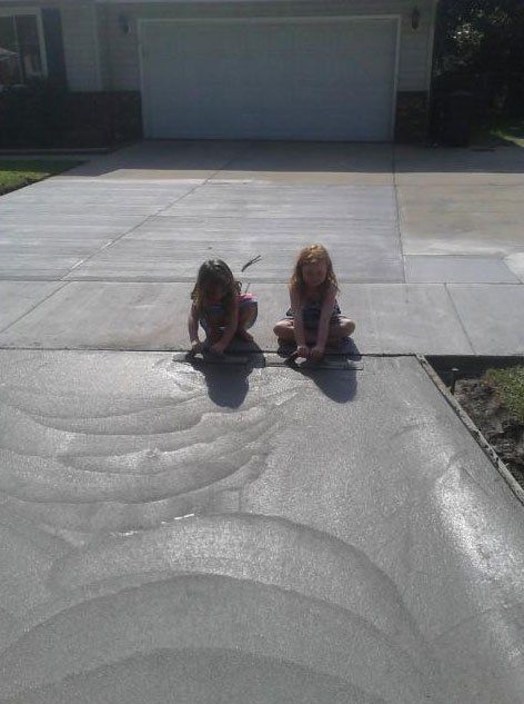 2 girls working on new concrete floor