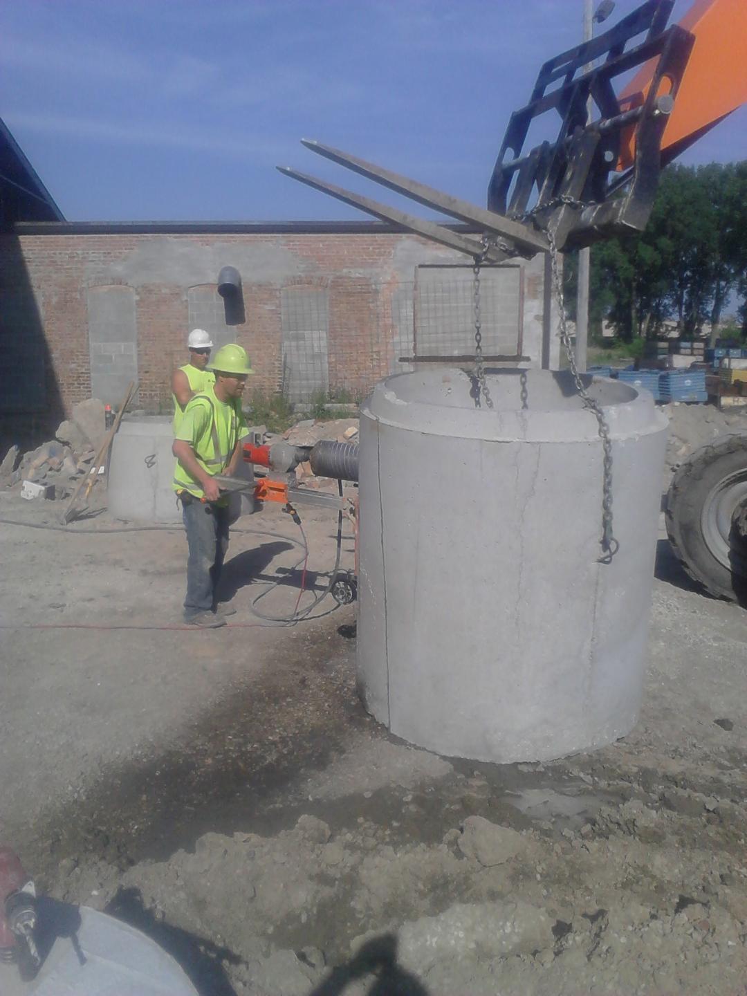 contractor with concrete tubes