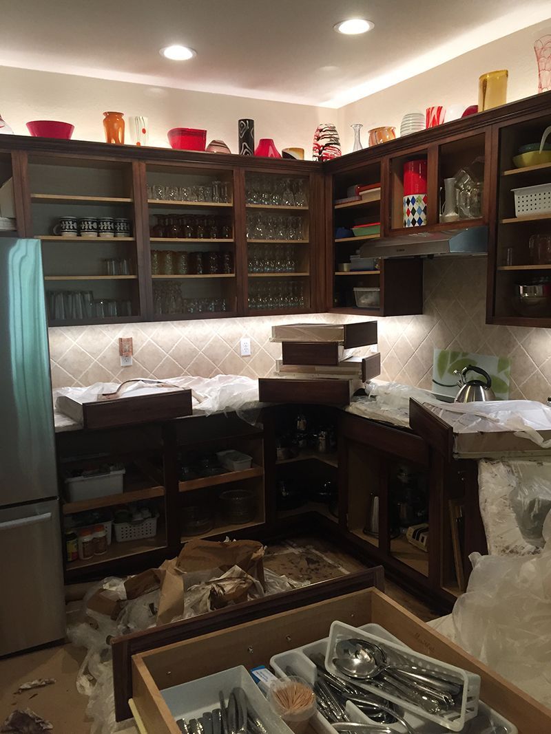 A kitchen with a lot of utensils in it