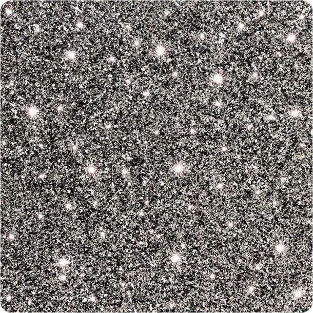 Close-up of a gray glittery textured surface with scattered white sparkles