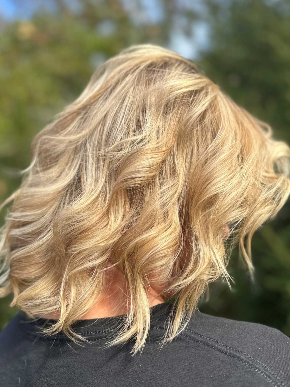 Medium length curly blonde hair
