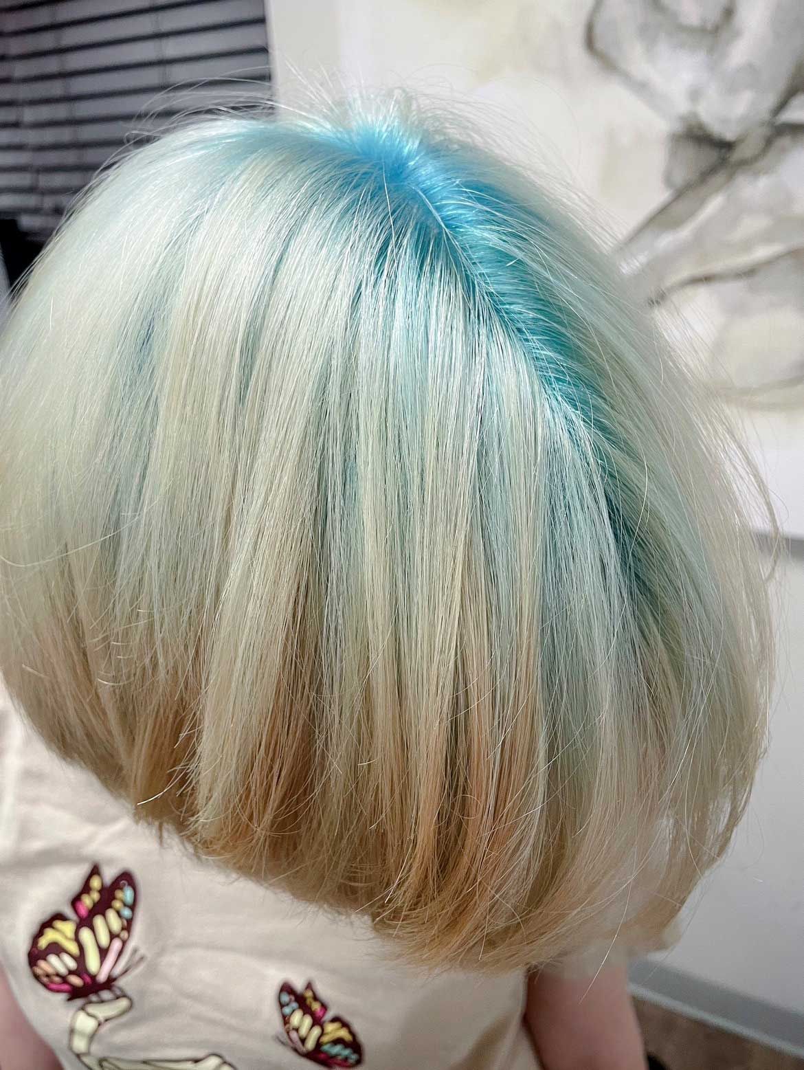 Blonde hair with light blue roots