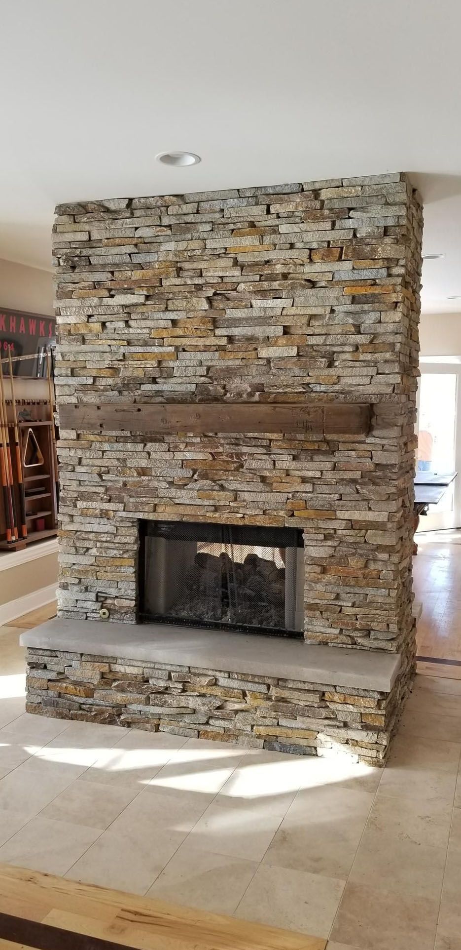 Cinammon bark ledgestone fireplace