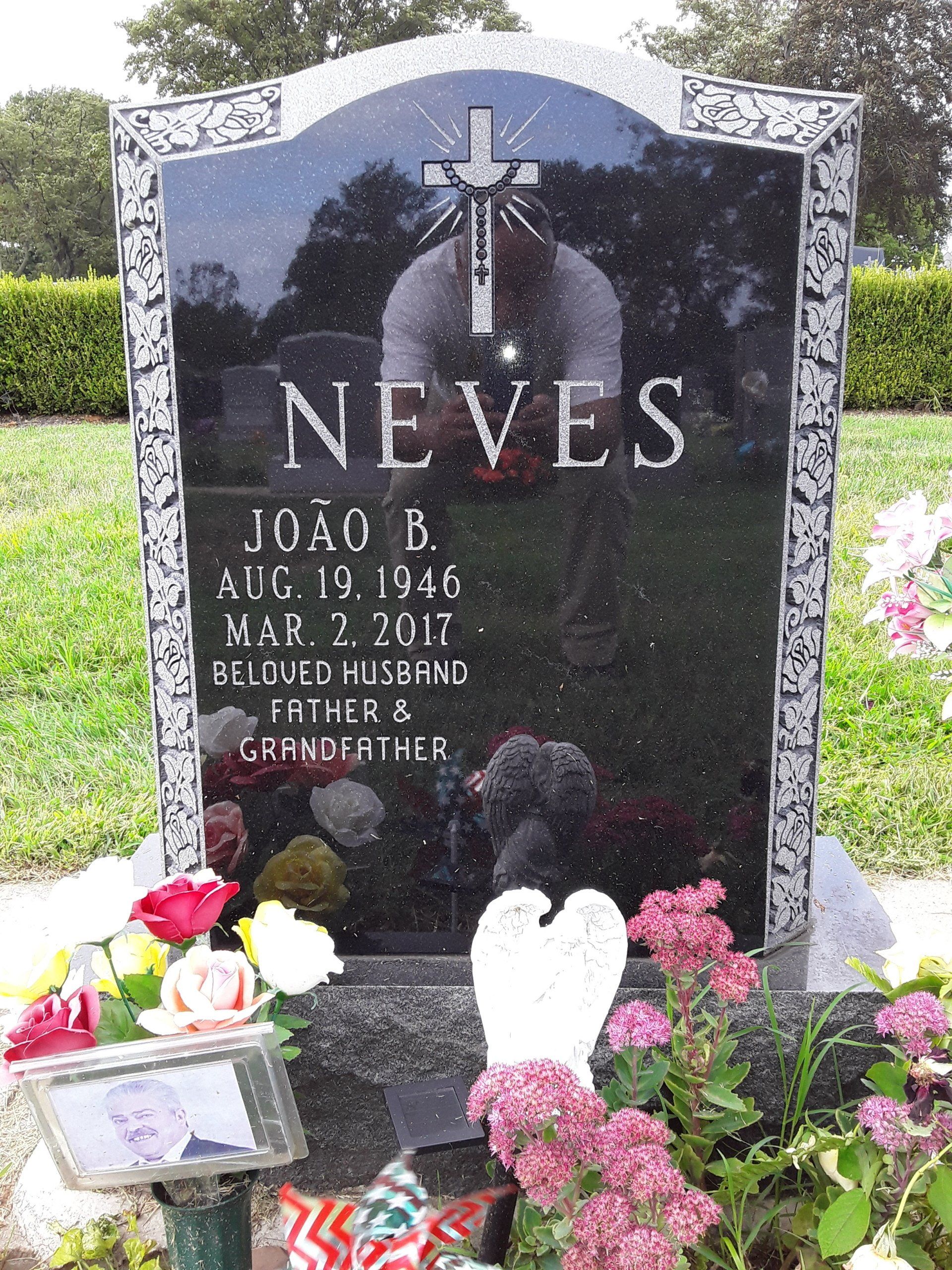 A gravestone for Joao B Neves in a cemetery