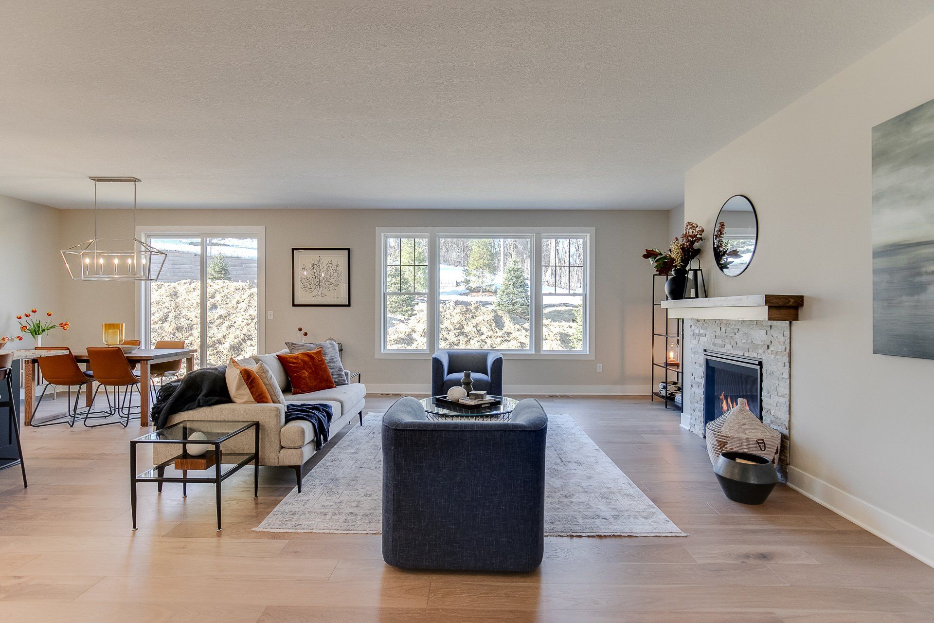 A living room with a fireplace and a couch