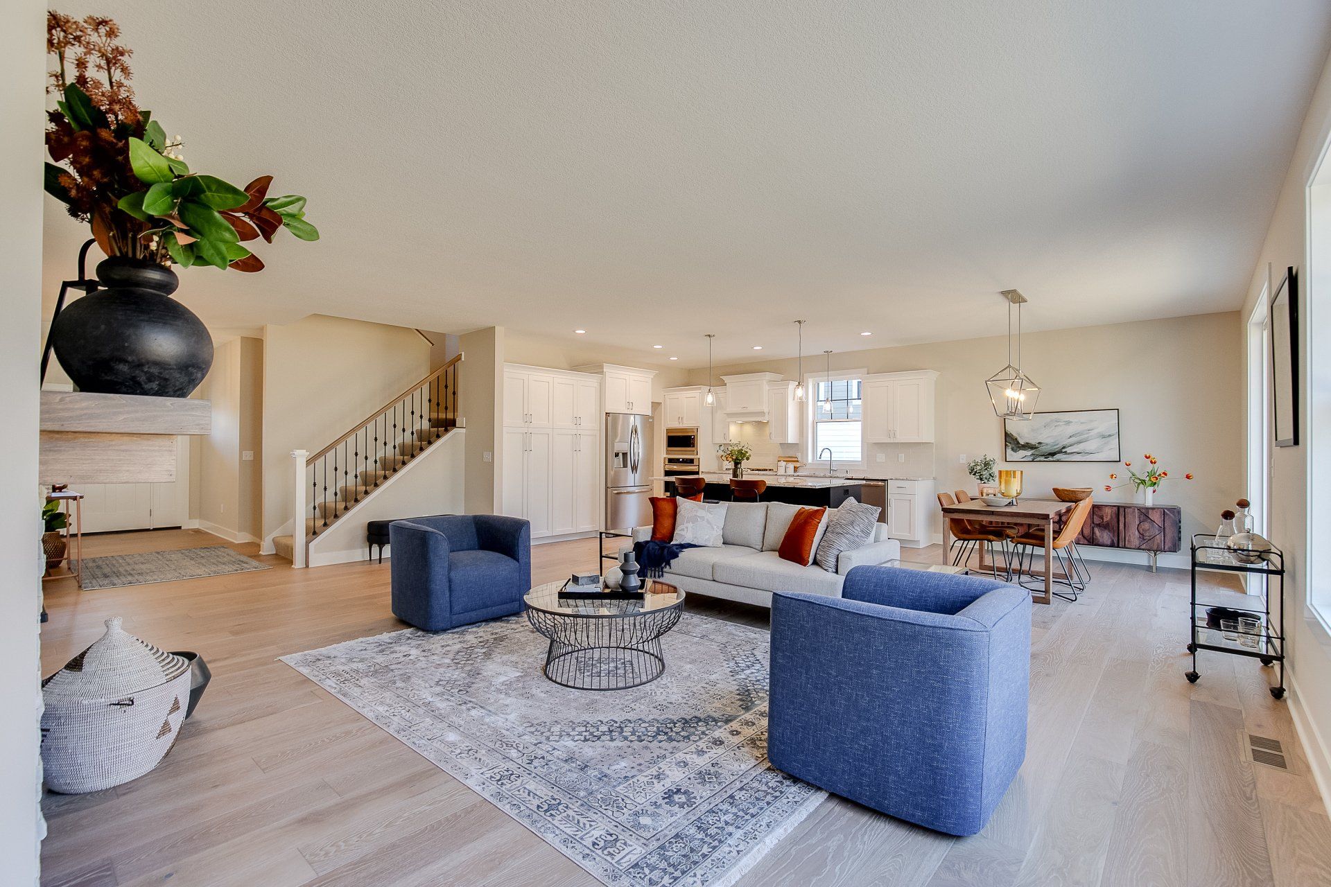 A living room filled with furniture and a fireplace.