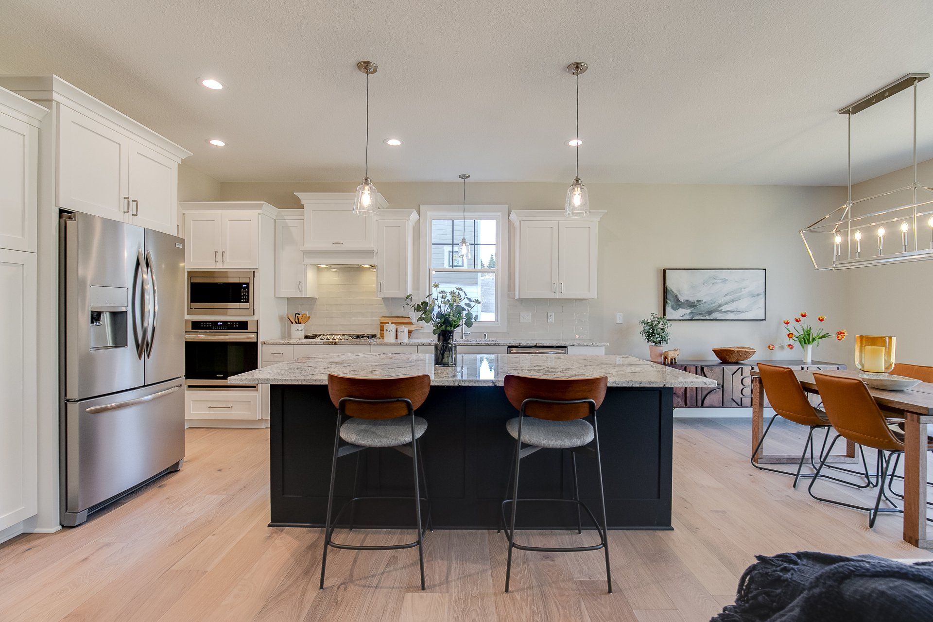 There is a large island in the middle of the kitchen.