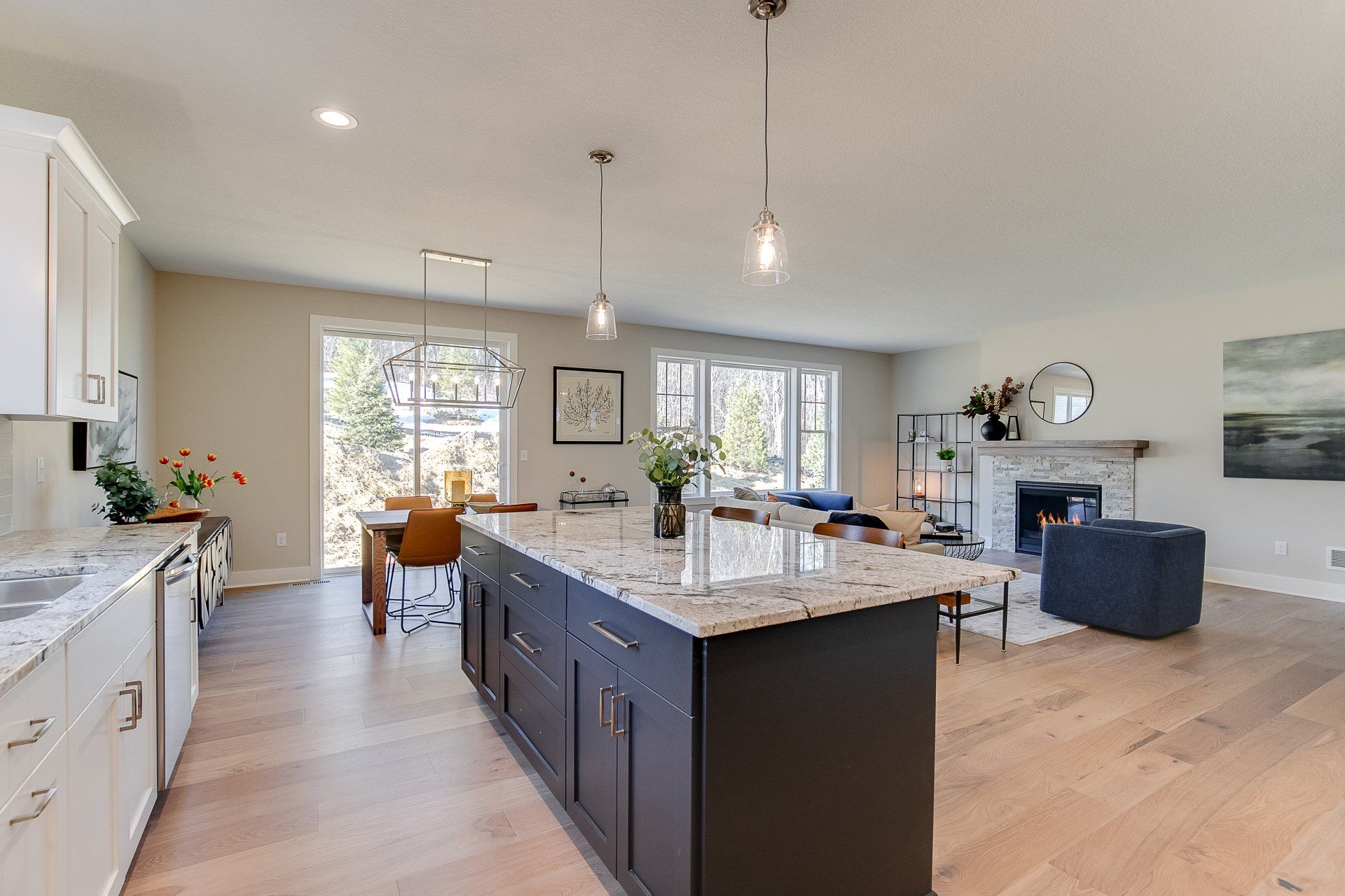 A kitchen with a large island in the middle of the room.
