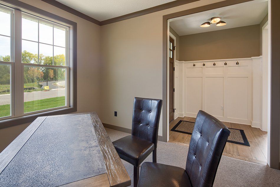 Table and chair in empty room
