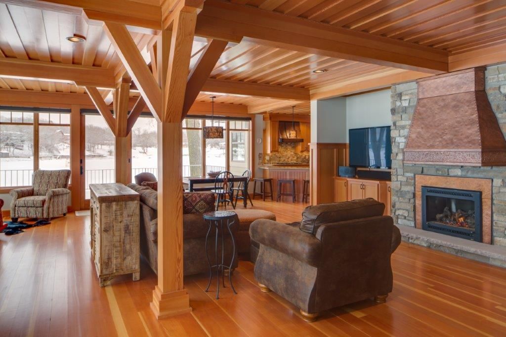 Fireplace area with brown couches