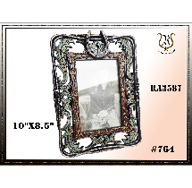 Ornate, rectangular picture frame, 10x8.5, with a decorative floral design and clasp at the top.