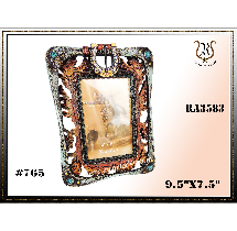 Ornate photo frame with bronze and turquoise accents; displays a landscape photo. 9.5x7.5.