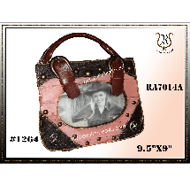 Pink and black handbag-shaped photo frame, holding a black and white photo of a woman. Frame features brown straps and stud embellishments.