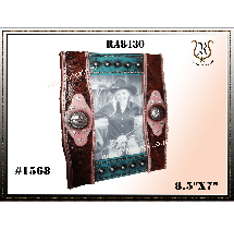 Western-style photo frame with a photo of a cowgirl. It's brown and turquoise, with embellishments like rhinestones. The frame is 9.5 x 7 inches.