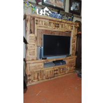 Rustic wooden entertainment center with a mounted TV, built-in storage, and a natural finish.