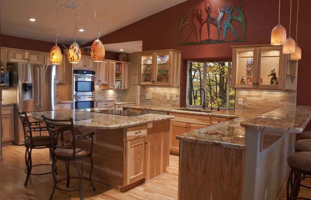 A kitchen with stainless steel appliances and granite counter tops