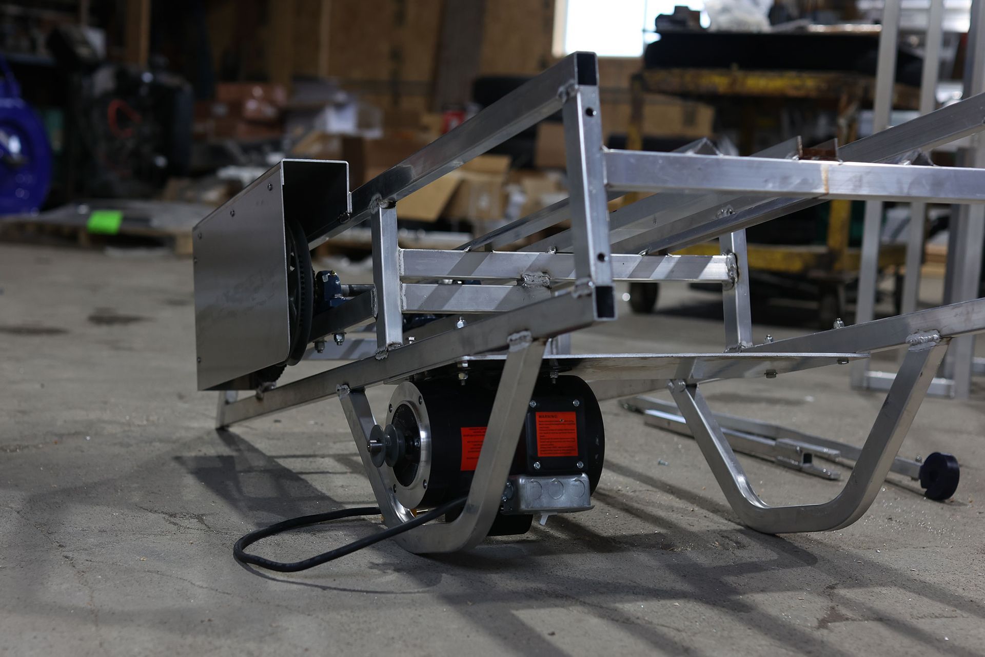 A metal frame with a motor attached to it