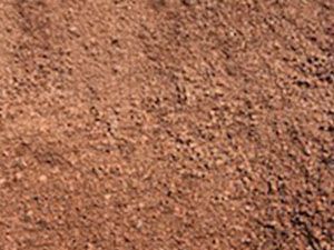 A close up of a brown carpet texture.