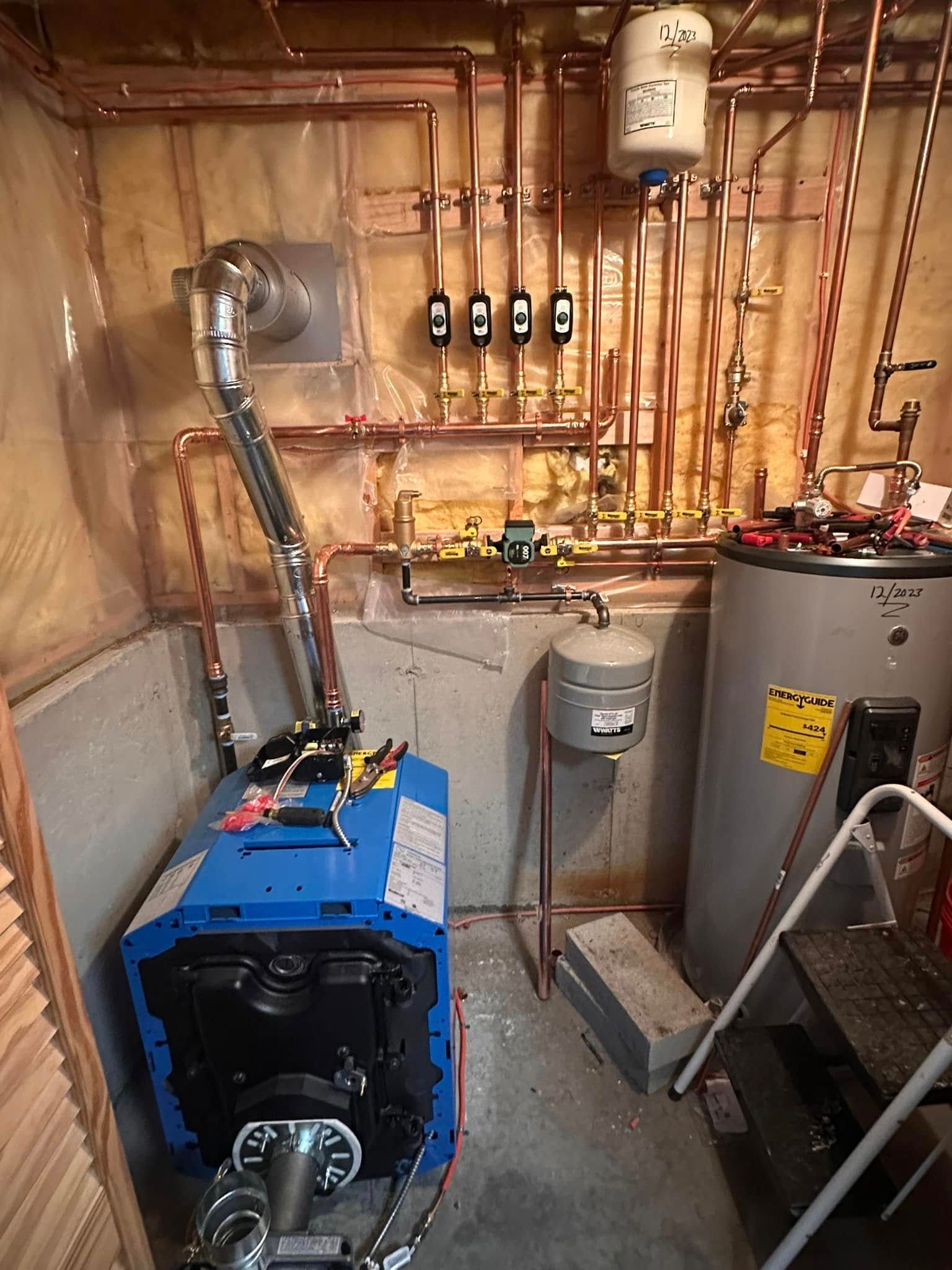 Boiler room with blue furnace, water heater, copper pipes, and ventilation ducting
