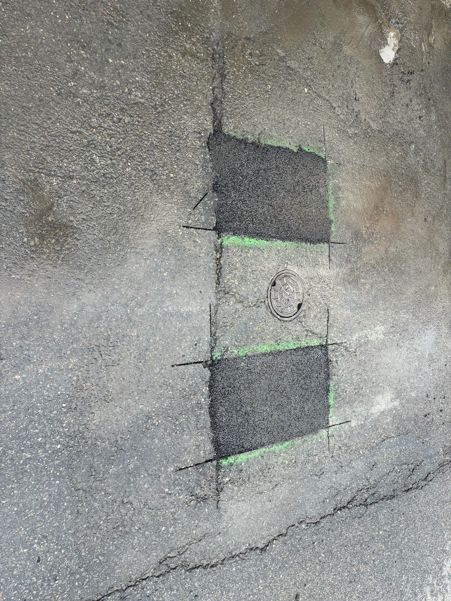 A shadow of a flag is painted on the ground.