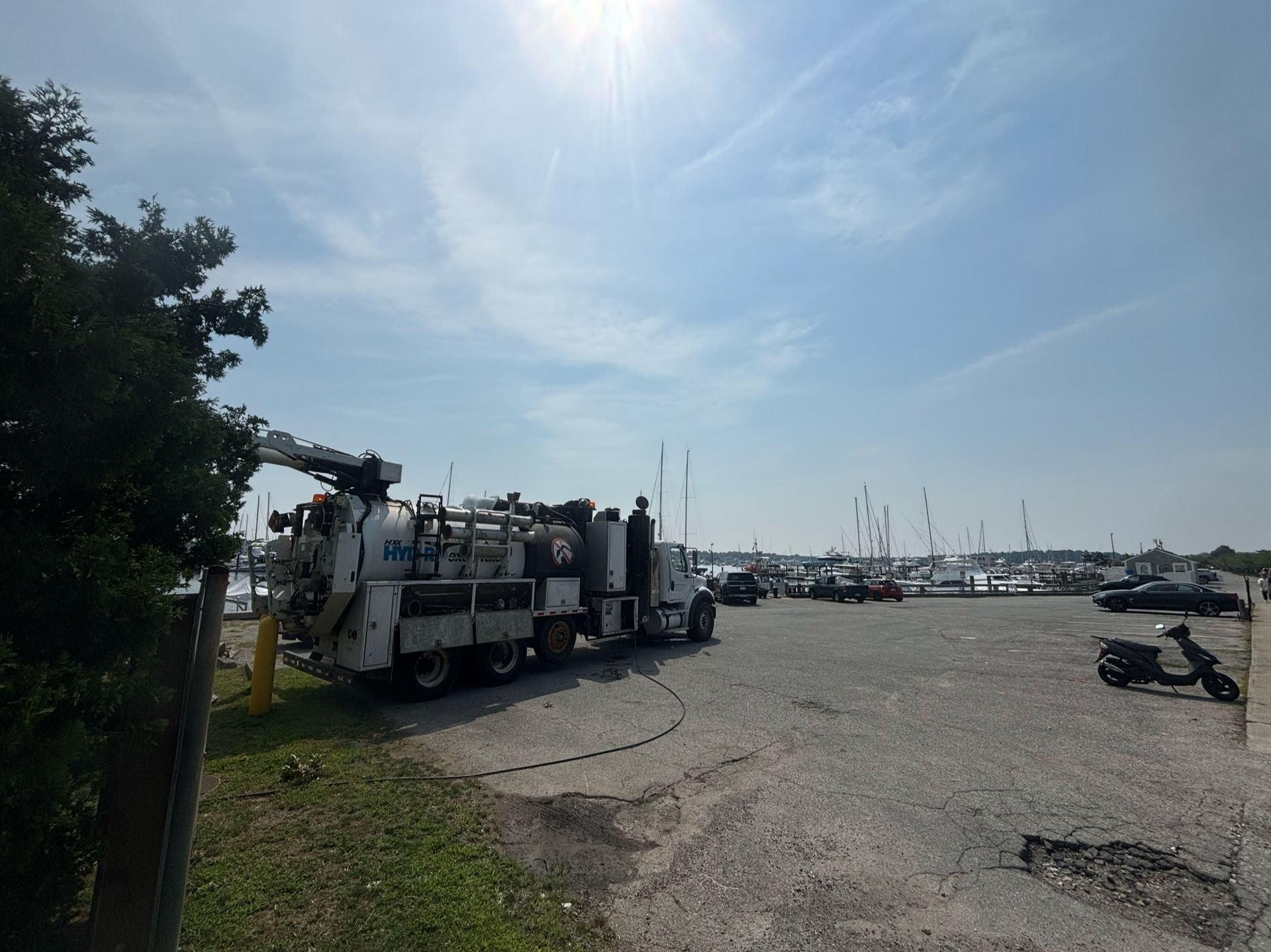 A large white truck is parked in a parking lot