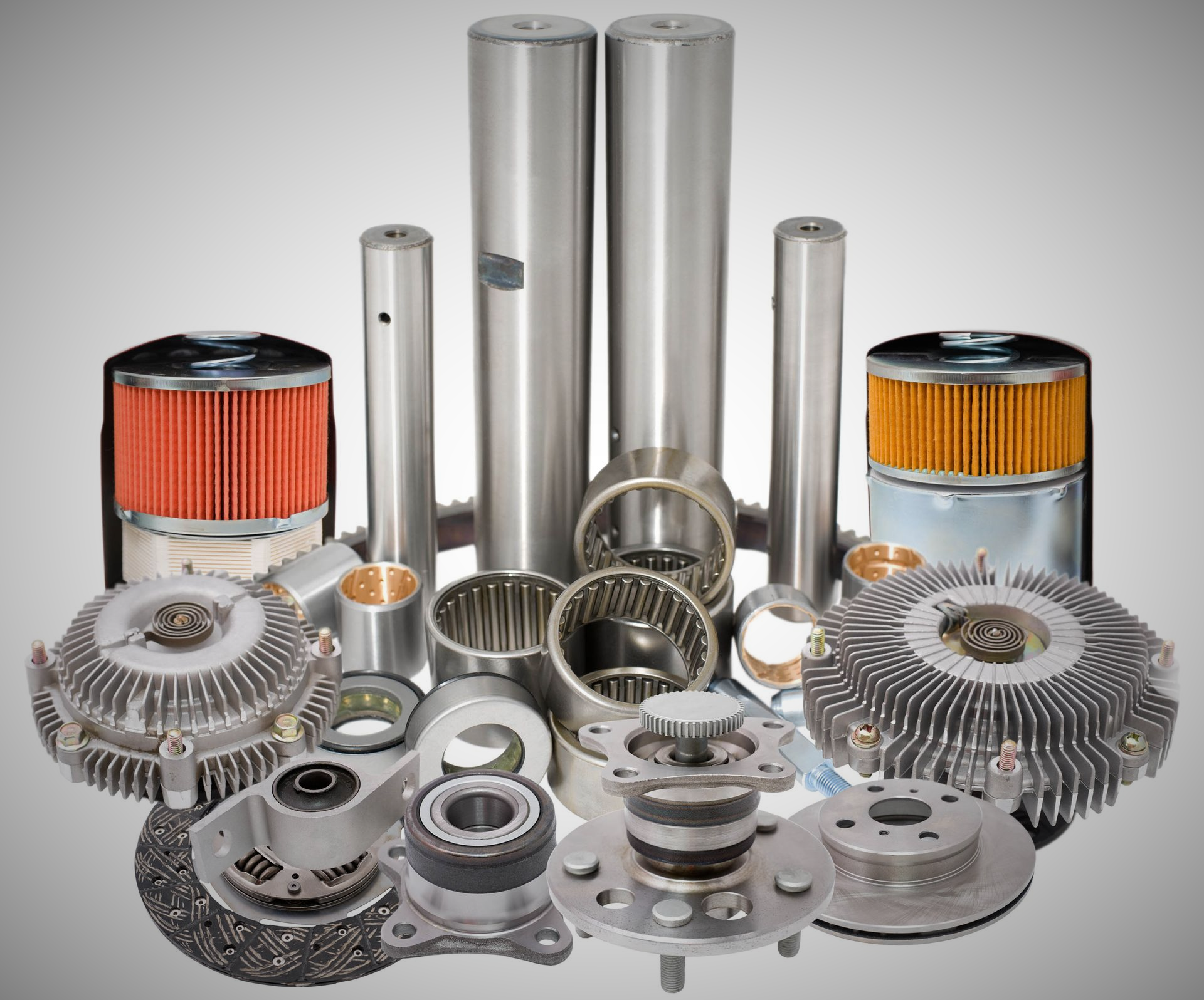 Collection of various metallic vehicle parts.