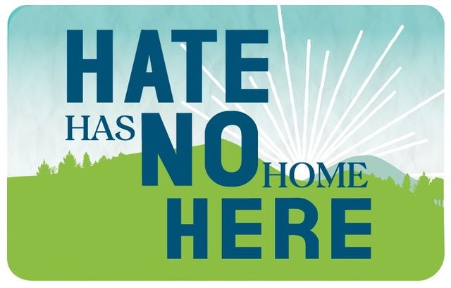 A graphic design promoting an anti-hate message, with the words 