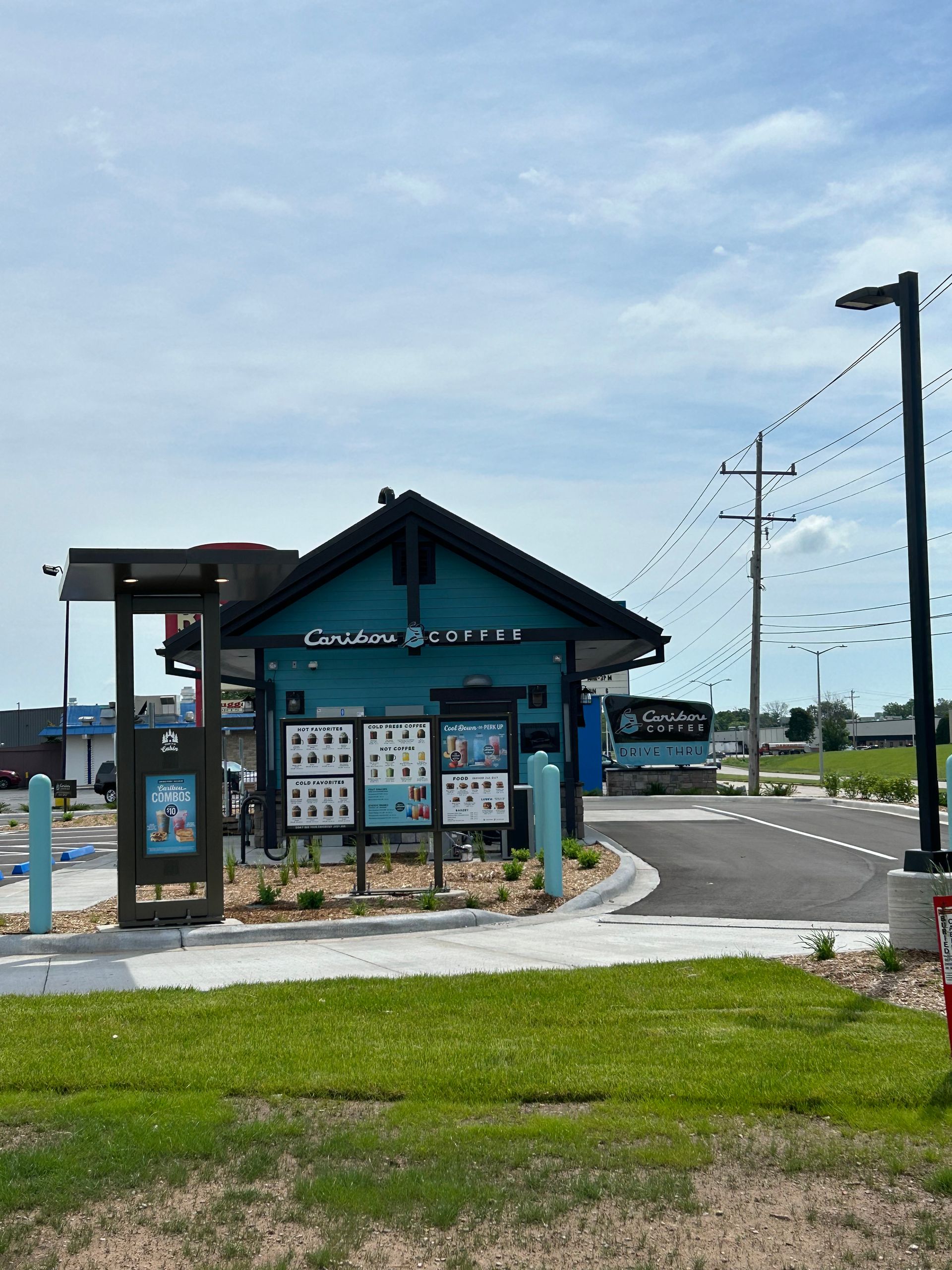 A blue and black building with the word chicken on it